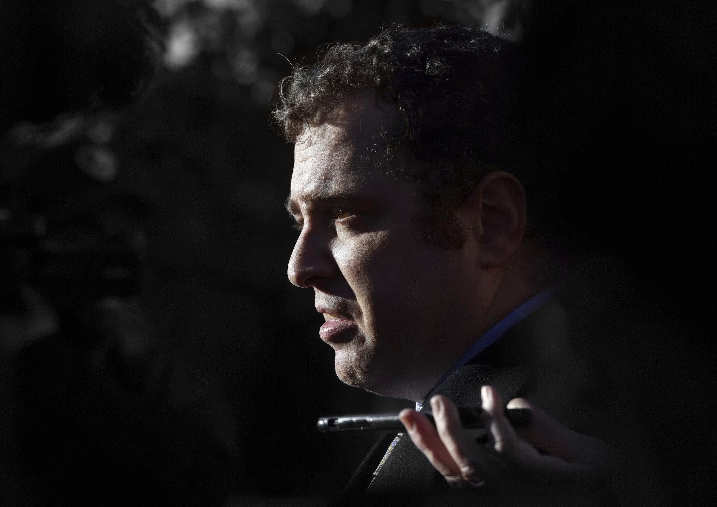 Attorney Joshua Smith taking a call